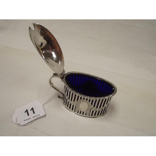 11 - Edwardian oval silver mustard pot with pierced sides, blue glass liner, London 1905.