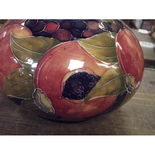 117 - Moorcroft Pomegranate vase, impressed marks with signature, 7.25 in. high.