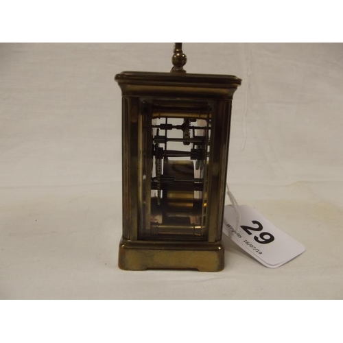 29 - Small gilded brass cased carriage clock, 3.25 in. high.