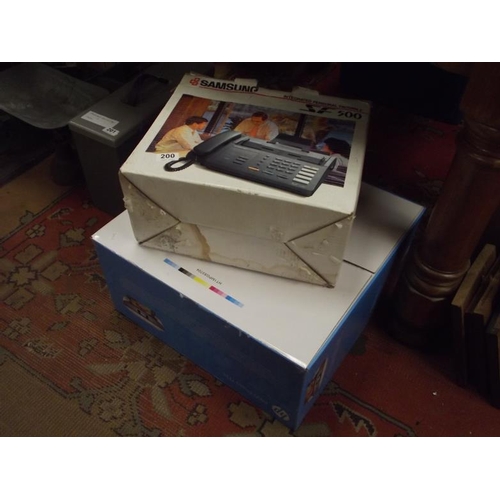 200 - Boxed HP ENVY Photo 7134, together with a Samsung SF500 fax machine.