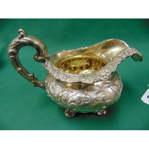 21 - Antique silver three piece silver tea service, comprising teapot, milk jug and sugar bowl, all havin... 