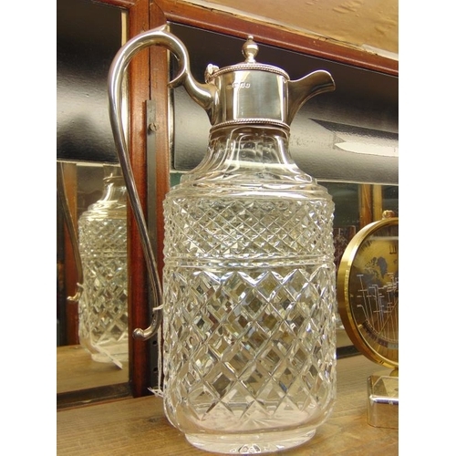 24 - Silver mounted cut glass claret jug, maker Israel Freeman & Son Ltd, London 1974.