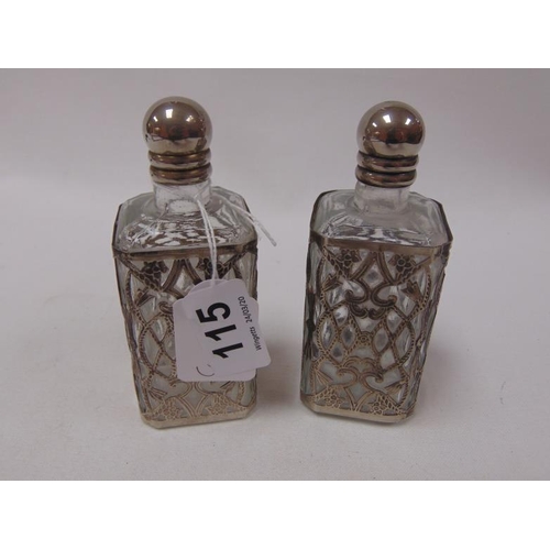 115 - Two white metal overlaid scent bottles.