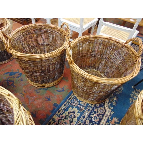 216 - Pair of large wicker two handled log baskets.