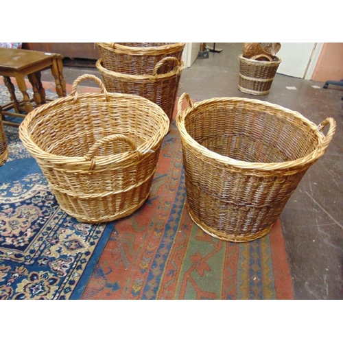 224 - Two large wicker log baskets.