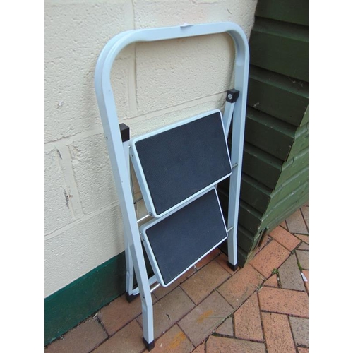 235 - Two tread folding step ladder.