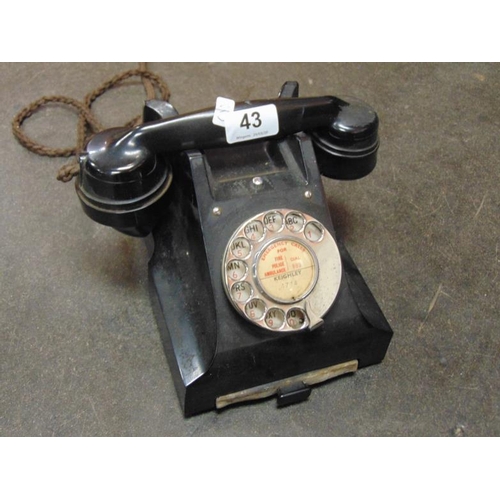 43 - Vintage black telephone.