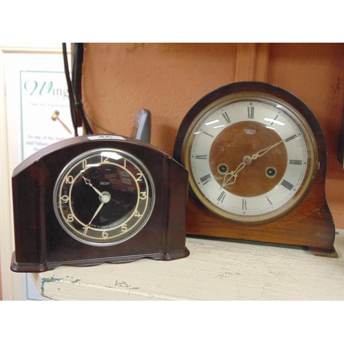 46 - Smiths bakelite dome top mantle clock and one other.