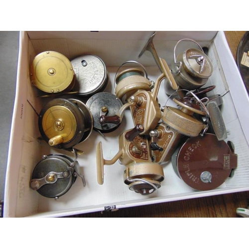 61 - Three Ambidex vintage casting reels and eight other vintage reels.