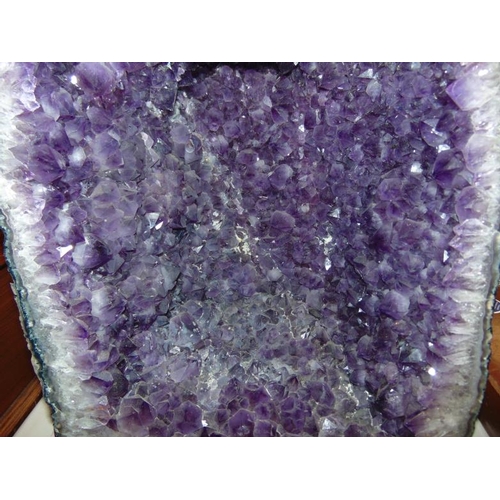 7 - An extremely large Amethyst crystal cathedral geode, approx 18 x 13.75 x 9