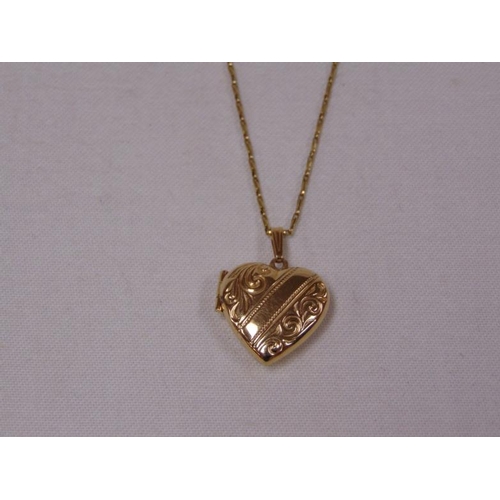 82 - 9ct gold locket and chain, 9g.