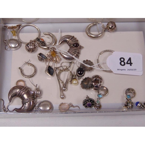 84 - Various silver earrings.
