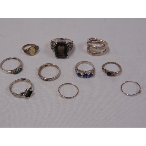85 - Various silver rings.