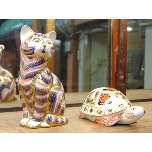 94 - Two Royal Crown Derby paperweights.
