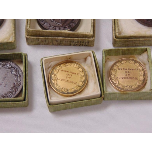 21 - Various boxed athletic medals.