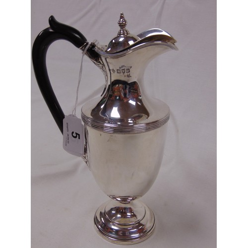 5 - George V silver claret jug with ebony handle, 9.25 in. high, London 1911, maker Horace Woodward & Co... 