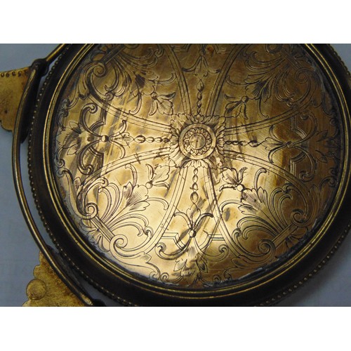19 - Gubelin Swiss gilt metal cased easel clock having cabochon set winder, blue guilloche enamel dial, t... 