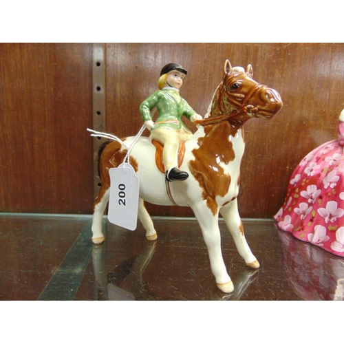 200 - Beswick Horse Girl on Pony No.1499- gloss finish, green jacket. 6