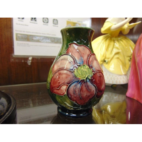 205 - William Moorcroft, small green floral Hibiscus vase, having paper label , 4