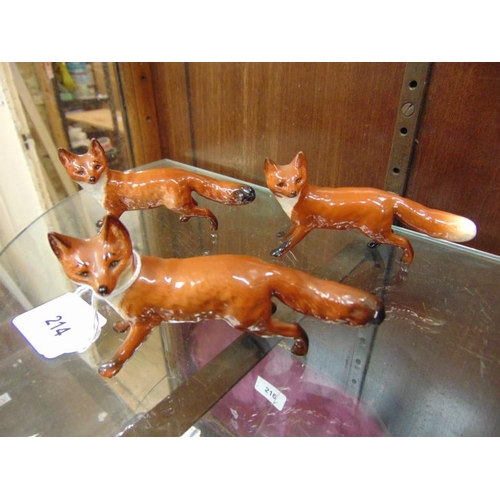 214 - Three Beswick Foxes.