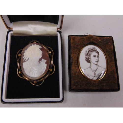 217 - Reproduction Cameo brooch and one other brooch commemorating Her Majesty Queen Elizabeth II .