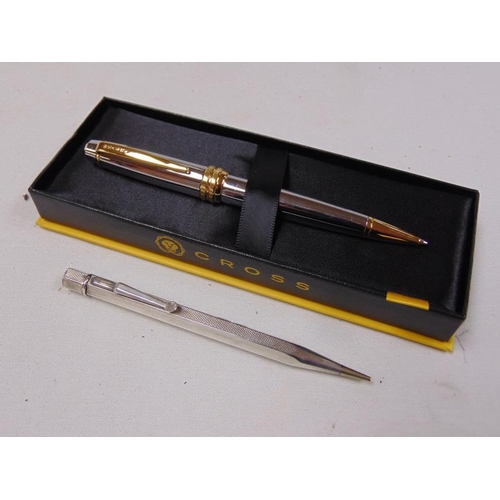 232 - Boxed Cross ball point pen together with a Silver cased propelling pencil (2).