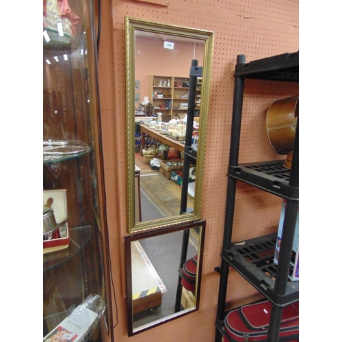 233 - Rectangular gilt framed wall mirror and one others.