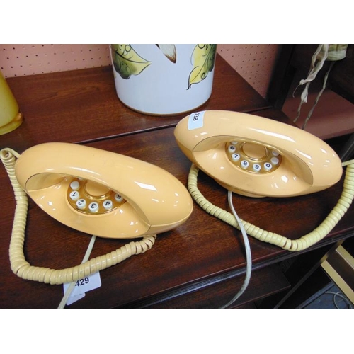 238 - Pair of retro telephones.