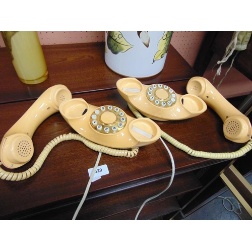 238 - Pair of retro telephones.