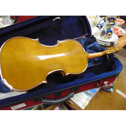 239 - Cased modern violin and bow.