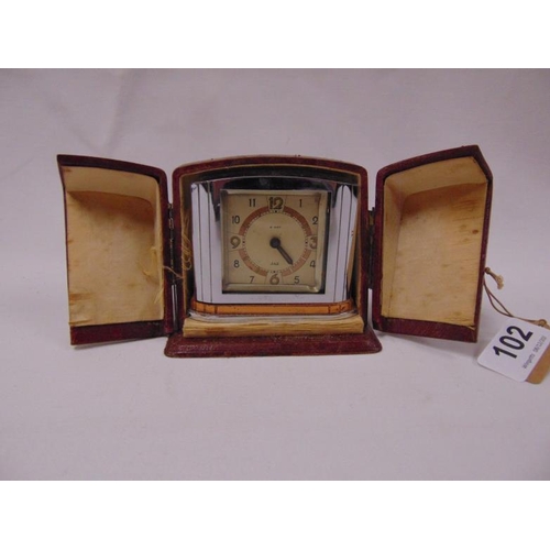 102 - Jaz chrome cased Art Deco travel clock in fitted case.