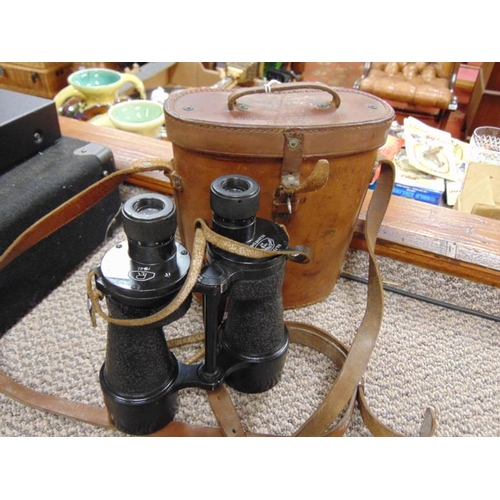 11 - Pair of World War Two naval binoculars, B. H. & G. Ltd 1944 binocular Prism No. 5 Case MK1.