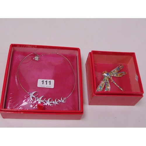 111 - Butler & Wilson boxed dragonfly brooch and similar bird necklace.