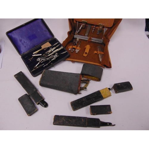 119 - Antique technical drawing set in shagreen case, another set, three cut throat razors, etc.