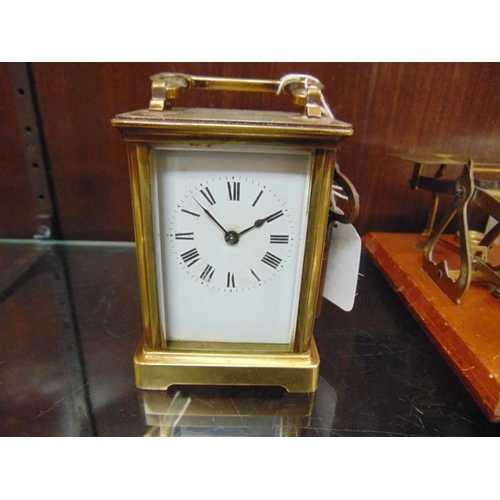 146 - French gilded brass cased carriage clock.