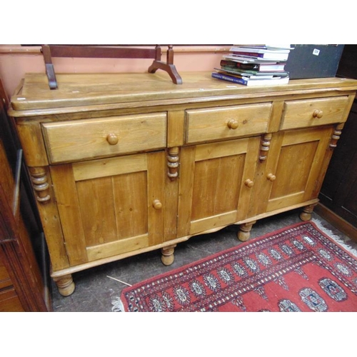 326 - Victorian style dresser base, rectangular top over three drawers and three cupboard doors with knob ... 