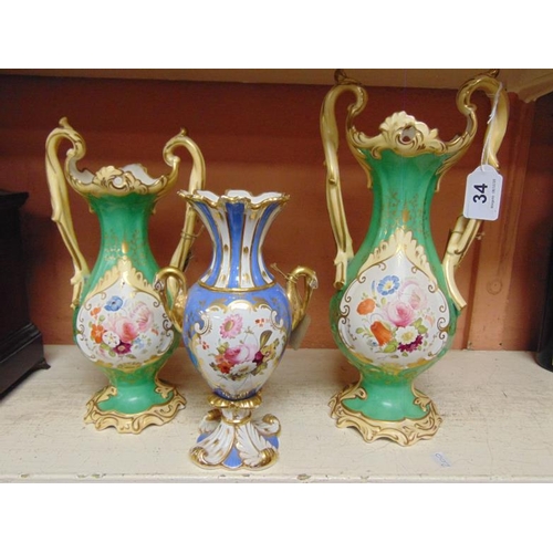 34 - Three 19th century floral painted porcelain vases, the tallest 12 in. high.