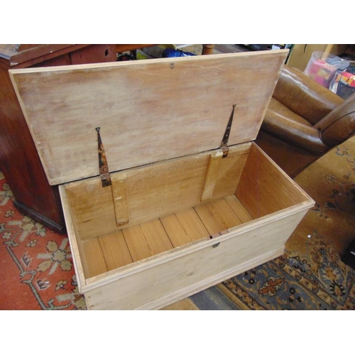 352 - Stripped pine blanket box, lift up lid and metal side handles. 19x 41.5x18.5