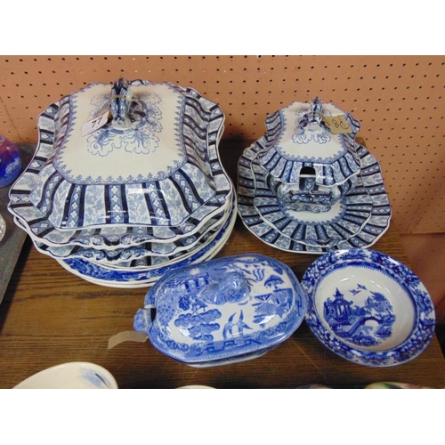 77 - Small blue and white transfer decorated tureen and cover, and two similar plates.