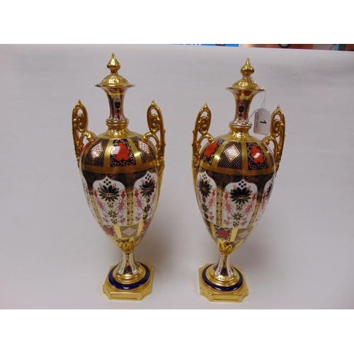 1 - Pair of superb quality Royal Crown Derby Old Imari urn shape lidded vases with heavy gold banding, 1... 