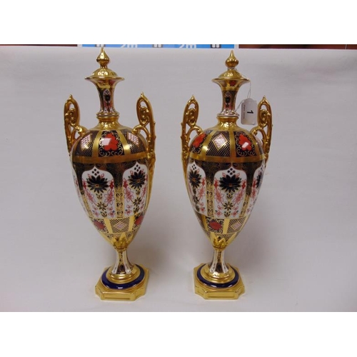 1 - Pair of superb quality Royal Crown Derby Old Imari urn shape lidded vases with heavy gold banding, 1... 