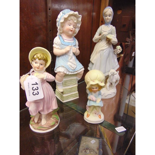 133 - Four china figurines