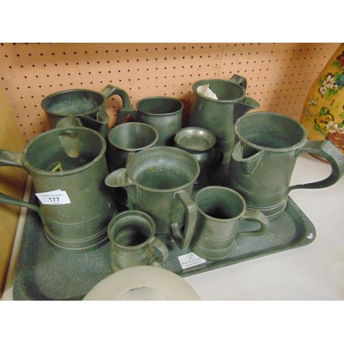 177 - Collection of antique pewter tankards, with side spouts.