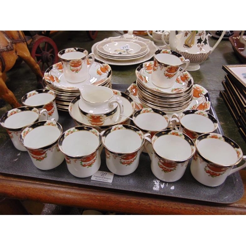 215 - C.W.S gilt and floral decorated aprox 40 piece tea set.