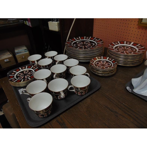 24 - Royal Crown Derby Old Imari dinner and tea service with heavy gold banding, 1128 pattern, first qual... 