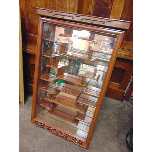 292 - An Oriental hardwood wall cabinet, 33 x 20 x 4.5