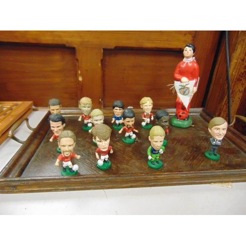 295 - Small collection of resin Manchester United figures.