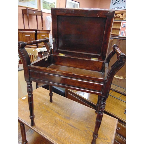 338 - Edwardian piano stool, turned side handles, lift up lid and on turned supports.