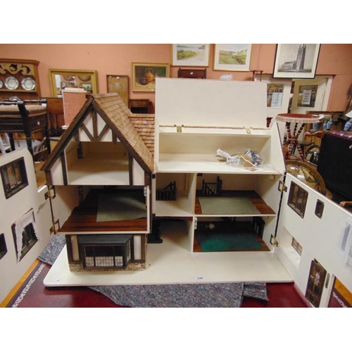 346 - Large wooden mock Tudor doll's house, 31 x 43 x 22