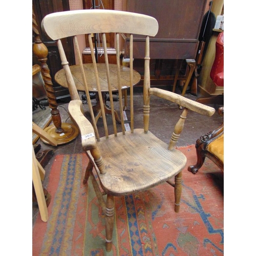 362 - Beech and elm farm house chair, stick back, open arms, solid seat and on turned supports.